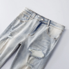 69_7dbdeefe-a2dc-471f-a103-0878976807d5 Amr Patch Ripped Blue Jeans