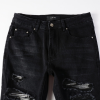 95_e7154a86-5893-44bb-a4cc-f23da0d73683 Amr Ripped Patch Black Jeans